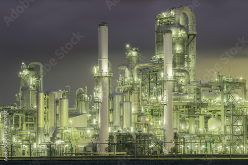 Illuminated chemical factory at night