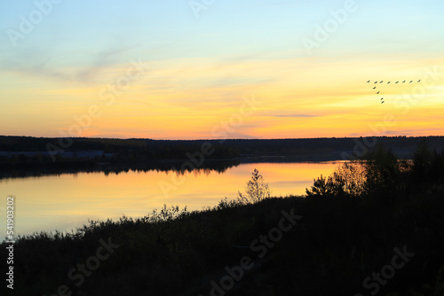 Mining successor landscape, renaturation, Lake "Schlabendorfer See", in sunset, Wanninchen - Luckau, Germany