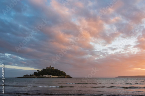 Lovely landscape image of St Michael's Mount in Cornwall England during soft pastel color sunset evening