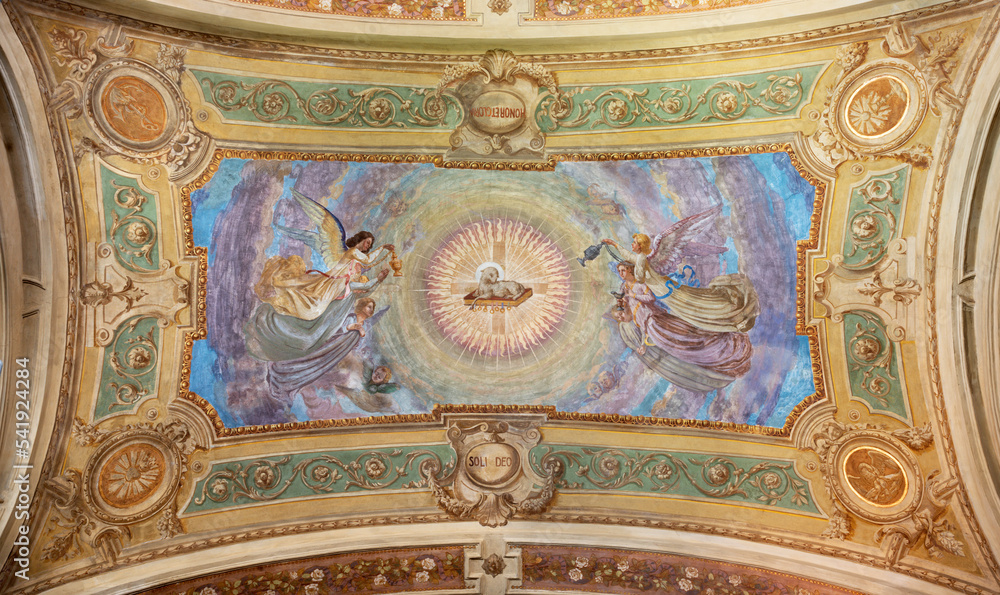 IVREA, ITALY - JULY 15, 2022: The ceiling fresco of Lamb of God among the angels in the church Chiesa di San Salvatore by G. Silvestro (1914).