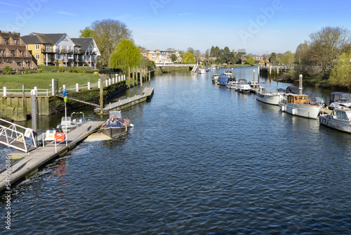 Upstream view from Teddington Lock of the river Thames on a sunny day photo