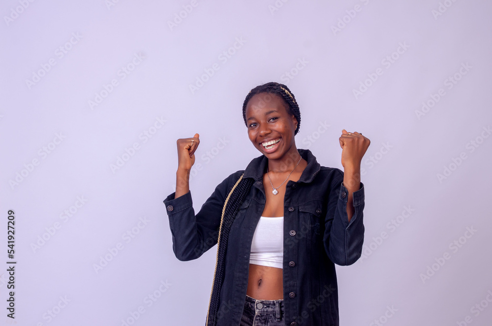 happy model showing a triumphant expression happy model showing a triumphant expression
