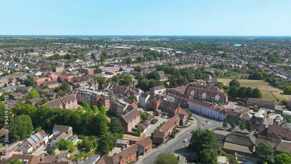Chichester, UK: Aerial view of city in England, famous historic town in West Sussex, summer day with clear blue sky - landscape panorama of United Kingdom from above Chichester, UK: Aerial view of city in England, famous historic town in West Sussex, summer day with clear blue sky - landscape panorama of United Kingdom from above
