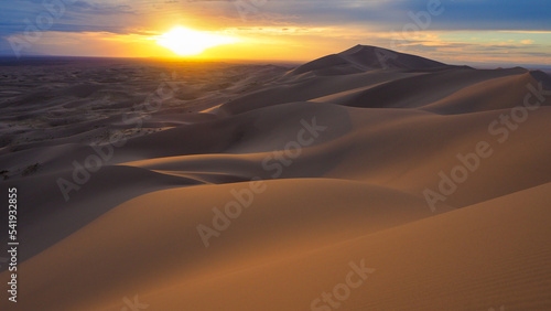 Sunset sky over Gobi desert dunes in Mongolia