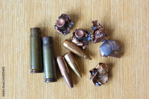 Bullets, shell casings, crumpled bullets from impact close-up