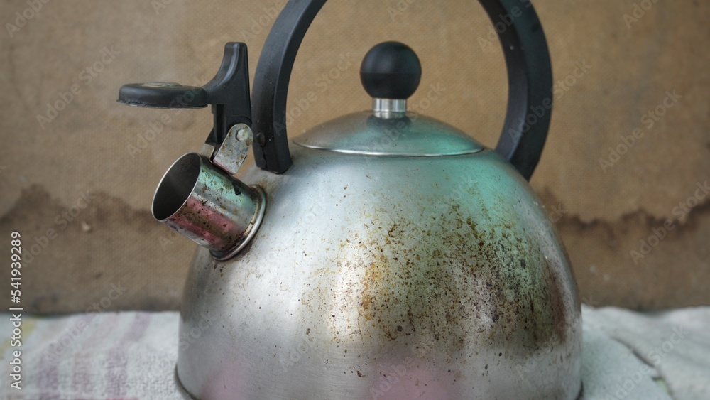 Black spots on a burnt teapot Stock Photo Adobe Stock