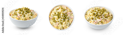 A portion of the traditional olivier salad is isolated on a white background. Set in different angles