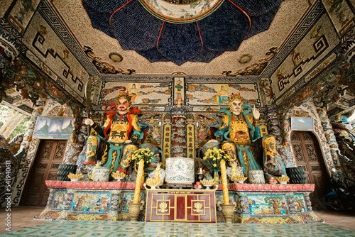Giant guardian sculptures in a Mahayana Buddhism altar in Linh Phuoc Pagoda in Da lat, Vietnam