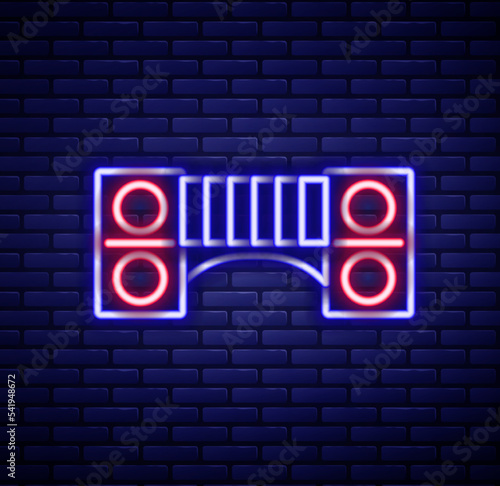 Glowing neon line Playground kids bridge icon isolated on brick wall background. Colorful outline concept. Vector