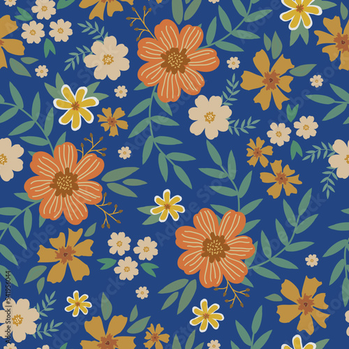 Cute floral pattern in a small flower. Seamless vector texture. An elegant template for fashionable prints. Print with orange and brown flowers, green leaves. blue background.