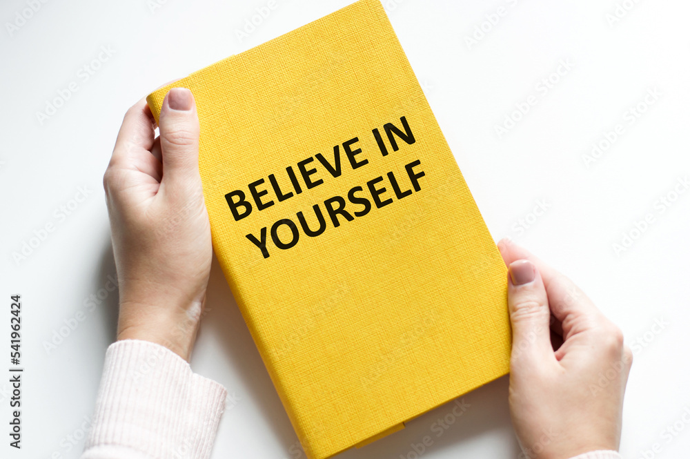Show wait word on paper shown by business man isolated on white background. Text believe in yourself Show wait word on paper shown by business man isolated on white background. Text believe in yourself