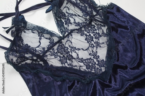Details shot of the modern classic sexy blue floral lace luxury elegance woman nightwear or sleepwear on white background. 
