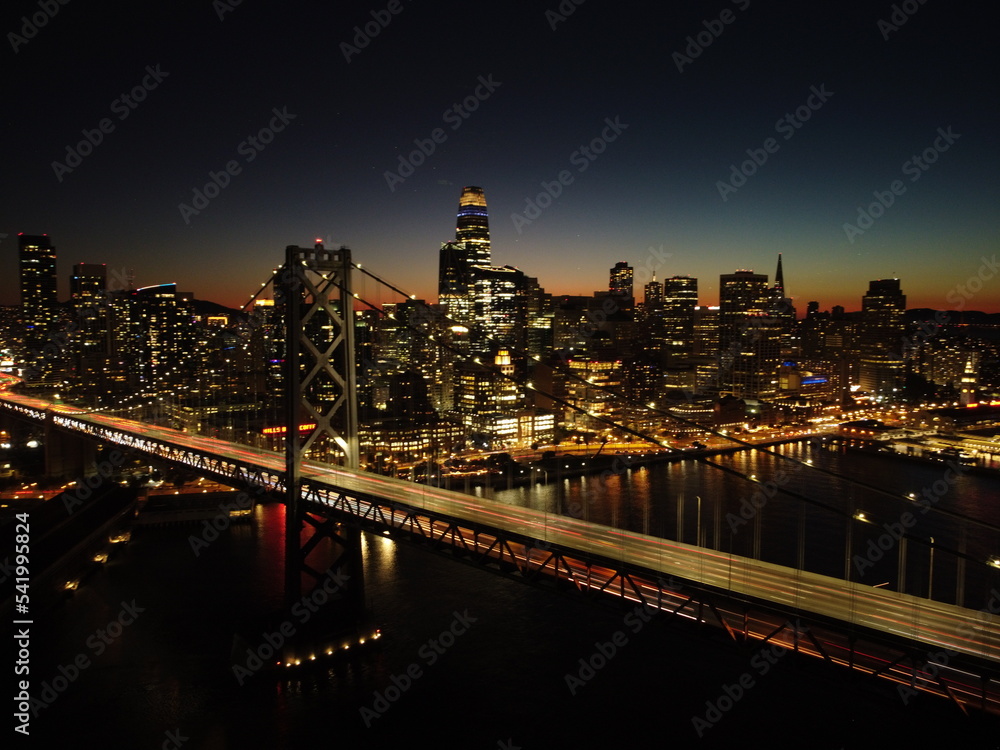 Fototapeta premium Bay Bridge in San Francisco at Night Aerial