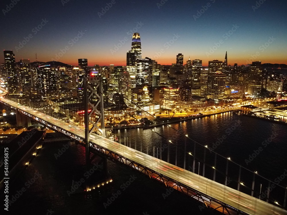 Fototapeta premium Bay Bridge in San Francisco at Night Aerial