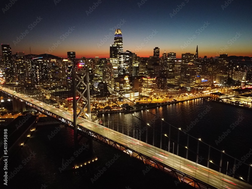 Fototapeta premium Bay Bridge in San Francisco at Night Aerial