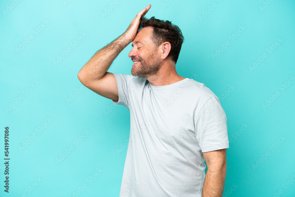 Middle age caucasian man isolated on blue background has realized something and intending the solution Middle age caucasian man isolated on blue background has realized something and intending the solution