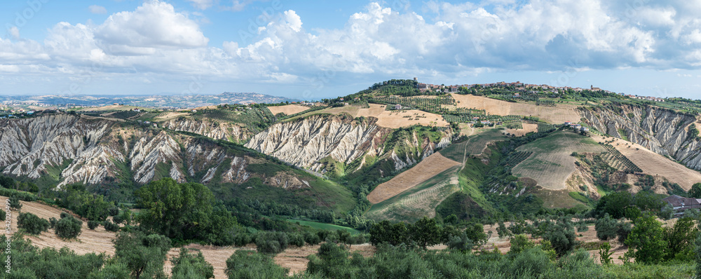 Extra wide angle panorama of Atri with its beautiful badlands
