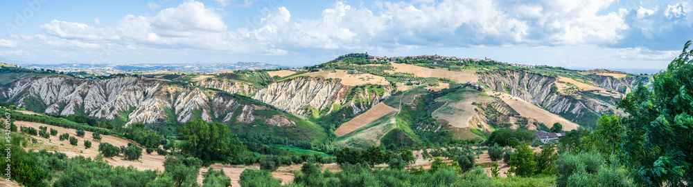 Extra wide angle panorama of Atri with its beautiful badlands