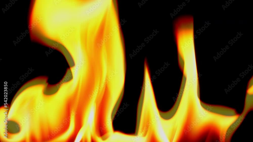 Slow motion fire flame burning on black background Slow motion fire flame burning on black background