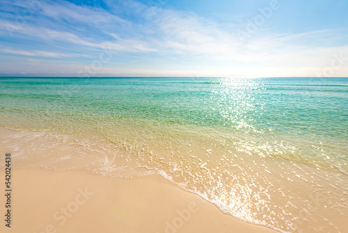 Fototapeta Naklejka Na Ścianę i Meble -  Shiny glitter shimmer waves with sun reflections on Gulf of Mexico ocean water with small ripples on sunny day at city of Miramar, Florida panhandle