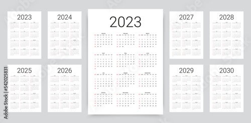 2023, 2024, 2025, 2026, 2027, 2028, 2029, 2030 years calendar. Week starts Sunday. Simple calender layout. Desk planner template with 12 months. Yearly diary. Organizer in English. Vector illustration photo