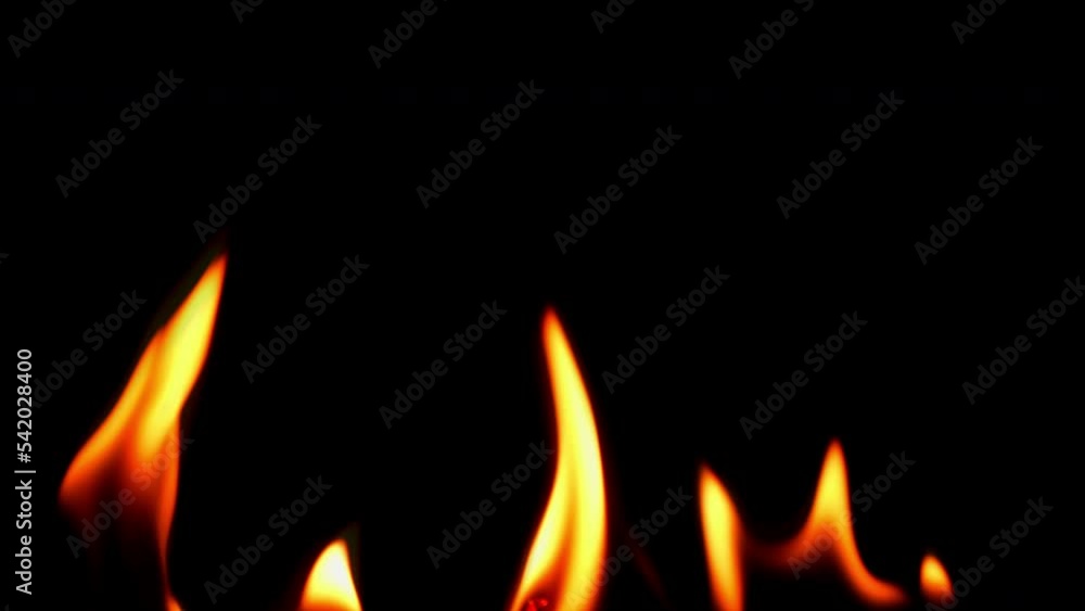 Slow motion fire flame burning on black background Slow motion fire flame burning on black background