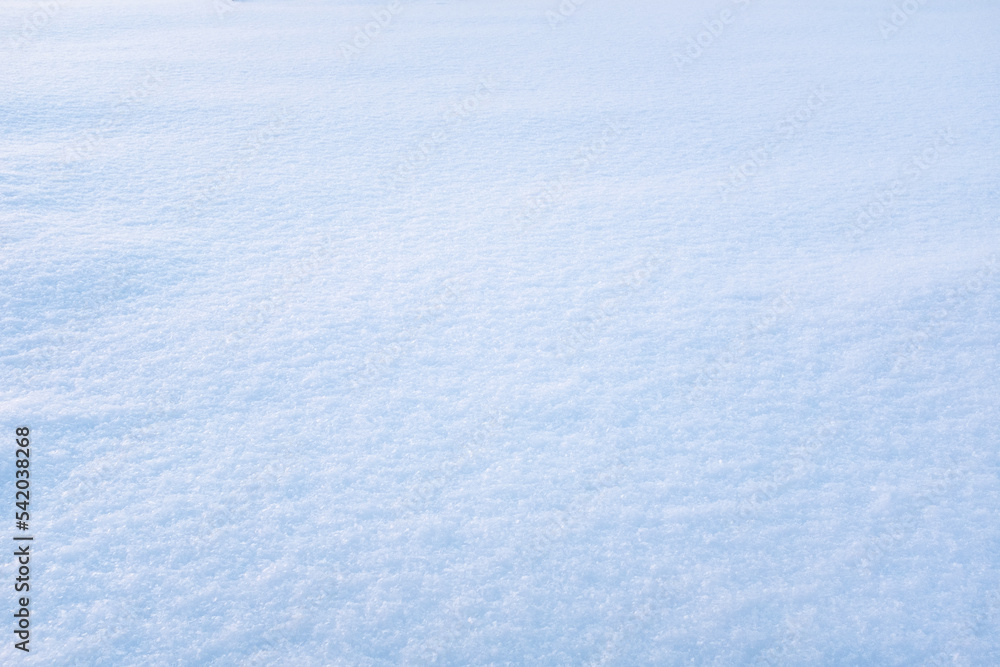Light blue snow background. Fluffy snow texture for a poster, calendar, post, screensaver, wallpaper, postcard, banner, cover, website. High quality photo