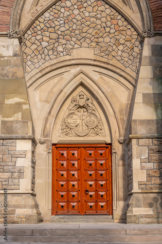 Ottawa, Ontario - October 19, 2022: Ornate Entrance to the East Block on Canada's Parliament Hill seen rising gracefully on a beautiful day. photo