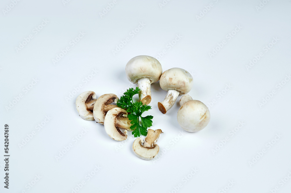 Sliced champignon mushrooms, white background Sliced champignon mushrooms, white background