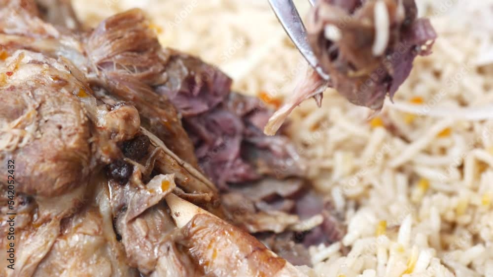 mutton biryani meal in a plate on table. mutton biryani meal in a plate on table.