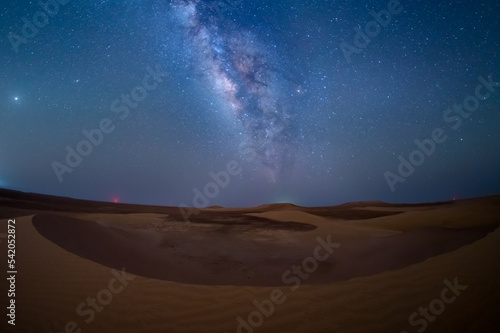 Milky way in desert above sand dune, empty quarter, Abu Dhabi, UAE.