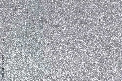 Silver bright sparkling sequins. Luxurious festive background.