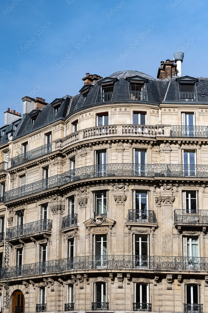 Paris, beautiful building, ancient facade boulevard Hausmann
