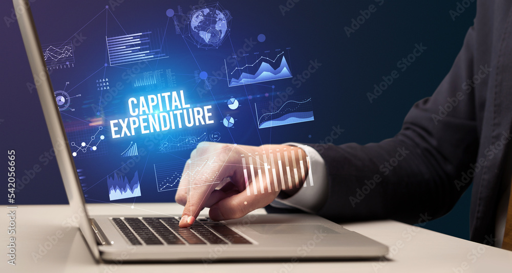Businessman working on laptop, business concept Businessman working on laptop, business concept