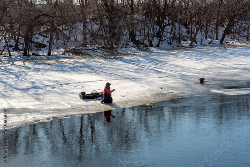 Ice Fishing On Fox River In Wisconsin In Late February