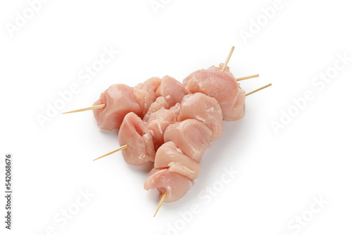 Raw uncooked Chicken meat, kebab on skewers isolated on a white background with clipping path, cut out.