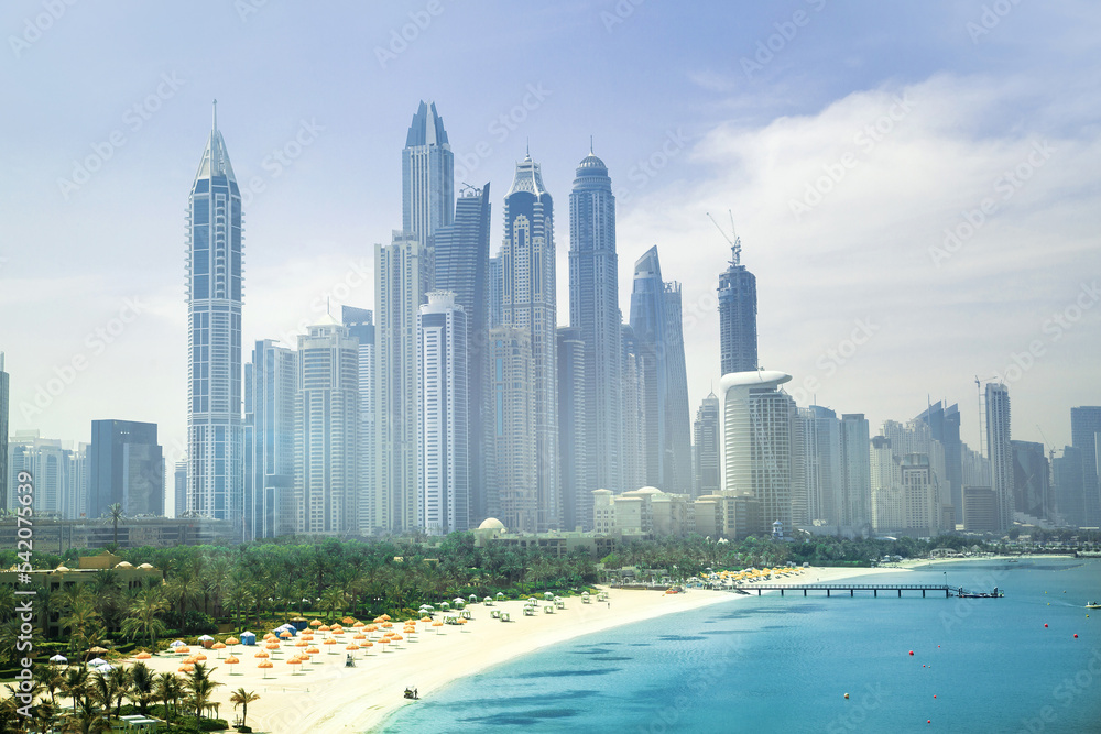Obraz premium Dubai Marina skyscrapers, complex of residential and office buildings with beautiful white sand beaches. Dubai, UAE