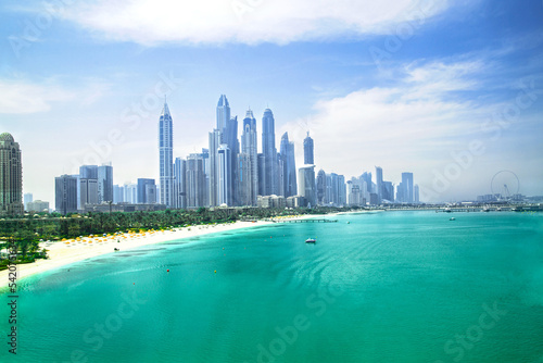 Dubai Marina skyscrapers, complex of residential and office buildings with beautiful white sand beaches. Dubai, UAE