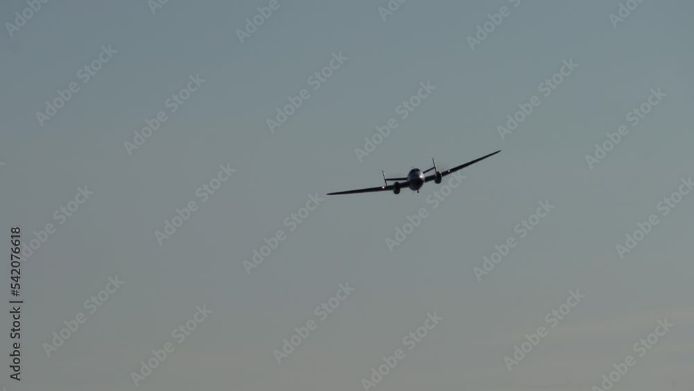 Turboprop plane flies towards. Two motors under wings. Turboprop plane flies towards. Two motors under wings.