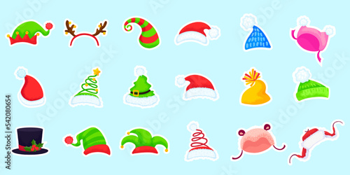 Set of stickers with winter and santa hats on blue background. Vector holiday illustration in cartoon style. All elements are isolated.