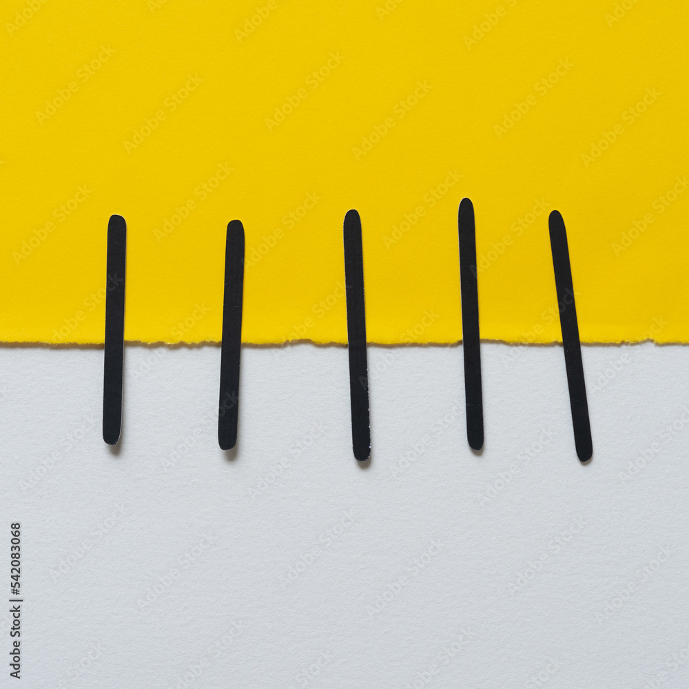 square yellow note paper and black vertical lines square yellow note paper and black vertical lines