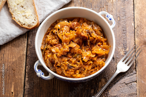 Traditional polish dish of bigos, cabbage with meat, mushrooms and prunes