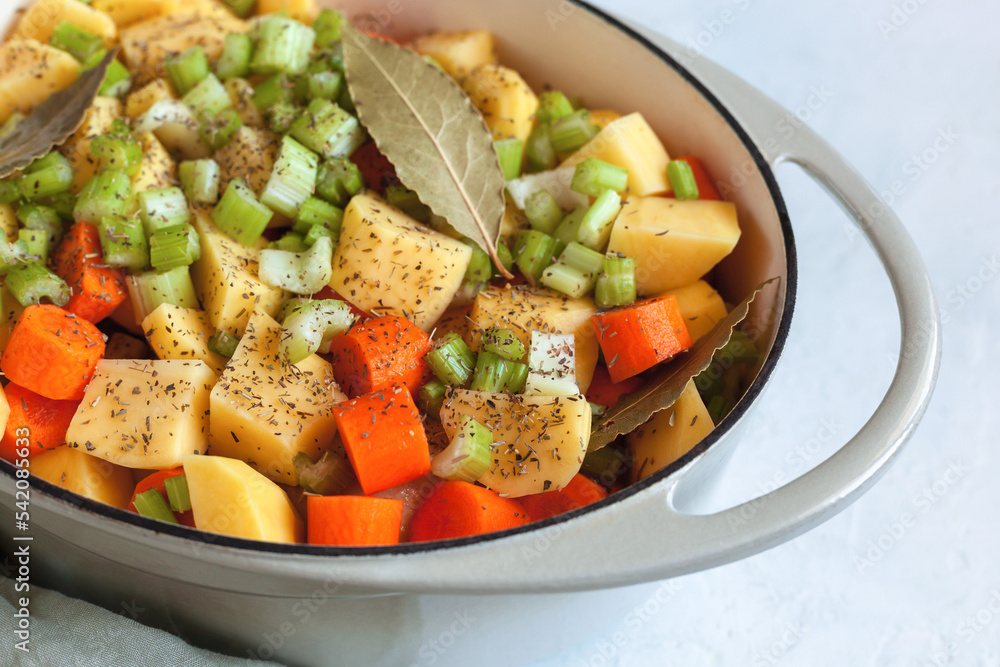 Slices of vegetables prepared for cooking in the oven Slices of vegetables prepared for cooking in the oven