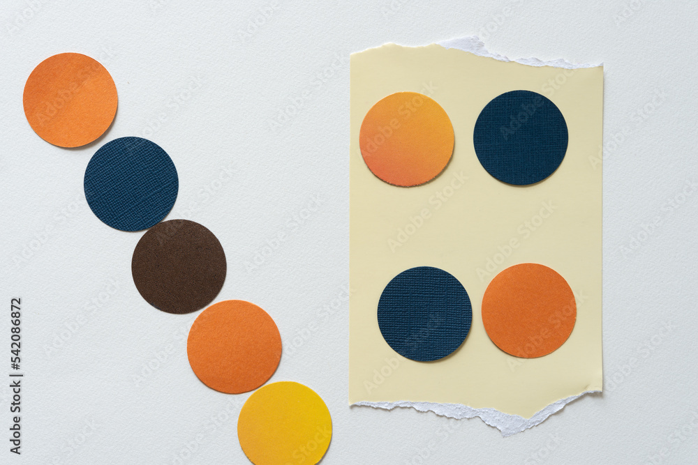 two sets of paper discs - one on torn paper card stock two sets of paper discs - one on torn paper card stock