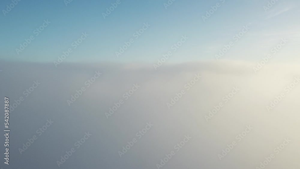 clouds recorded by a drone at a height of 150 meters, there is a clear sky above the clouds clouds recorded by a drone at a height of 150 meters, there is a clear sky above the clouds