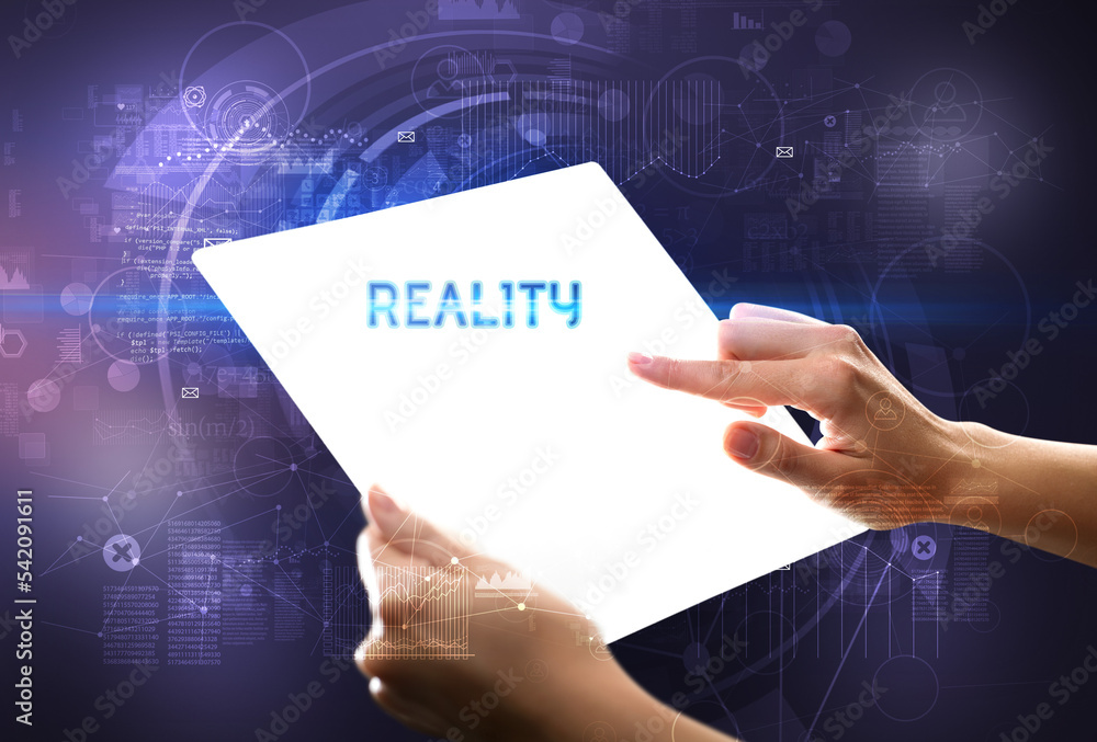 Hand holdig futuristic tablet , technology concept Hand holdig futuristic tablet , technology concept