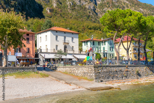 Fototapeta Naklejka Na Ścianę i Meble -  The boat ramp at the lakefront village of Onno, Italy, in the municipality of Oliveto Lario and province of Lecco on the shores of Lake Como. 