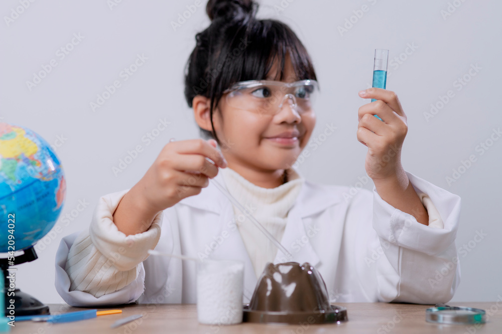 Asian Student Mixing Solution in Science Experiment Laboratory Class