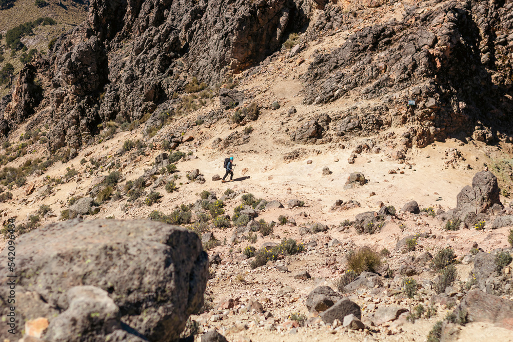 Woman hiker walking in volcano iztaccihuatl Woman hiker walking in volcano iztaccihuatl