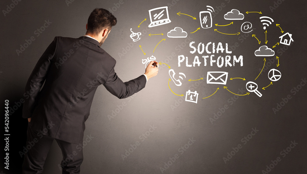 businessman drawing social media icons businessman drawing social media icons